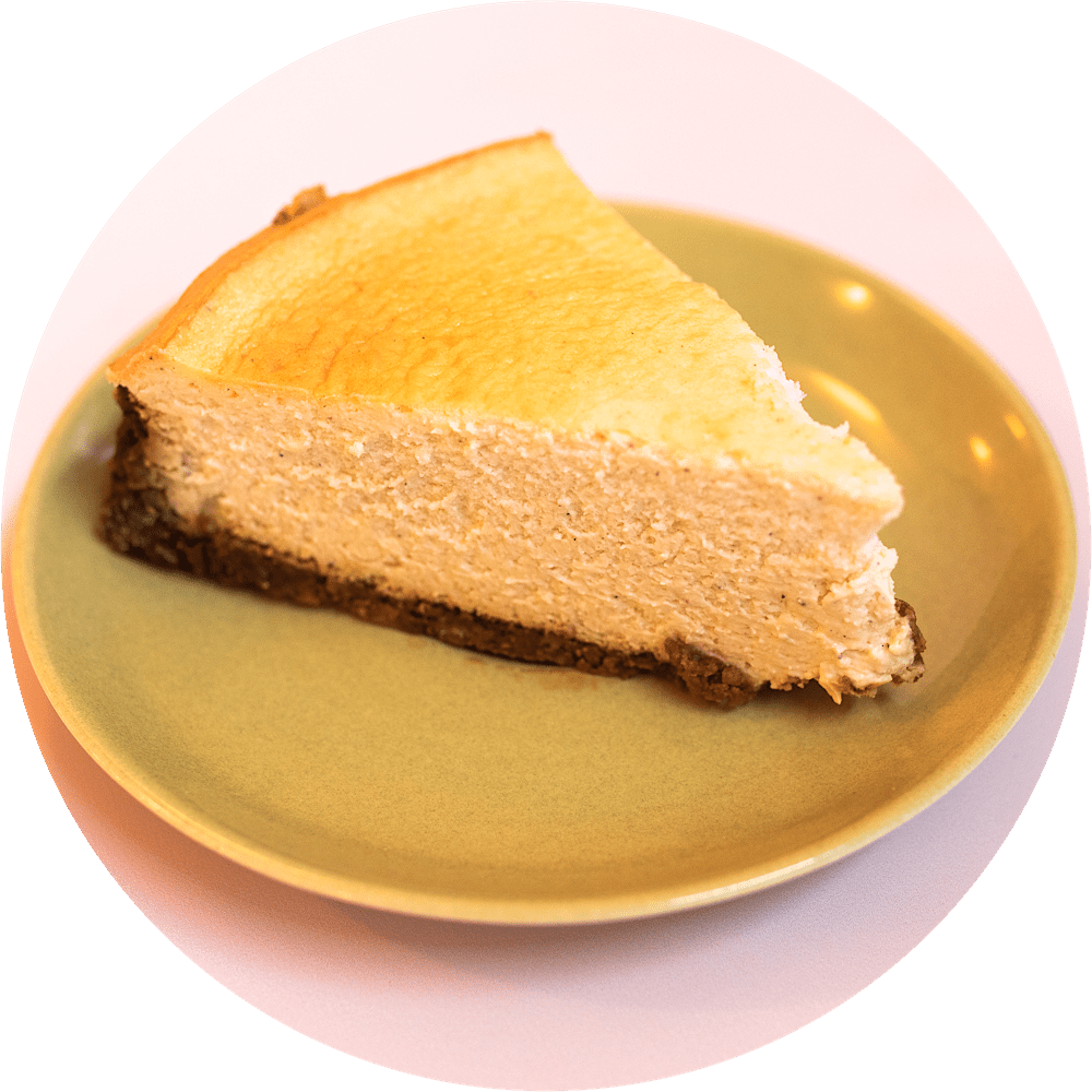New York cheesecake slice with pie crust base and vanilla bean from Petee's bakery NYC