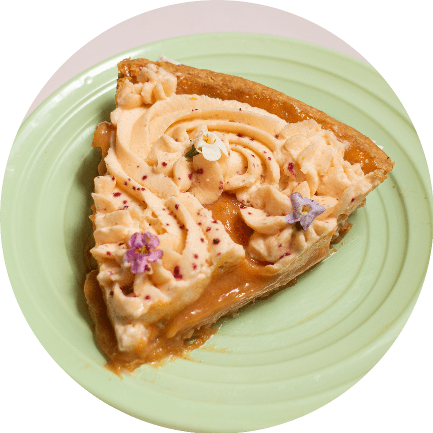 Tropical guava pie slice with whipped mascarpone and guava curd from Petee's Pie Company NYC