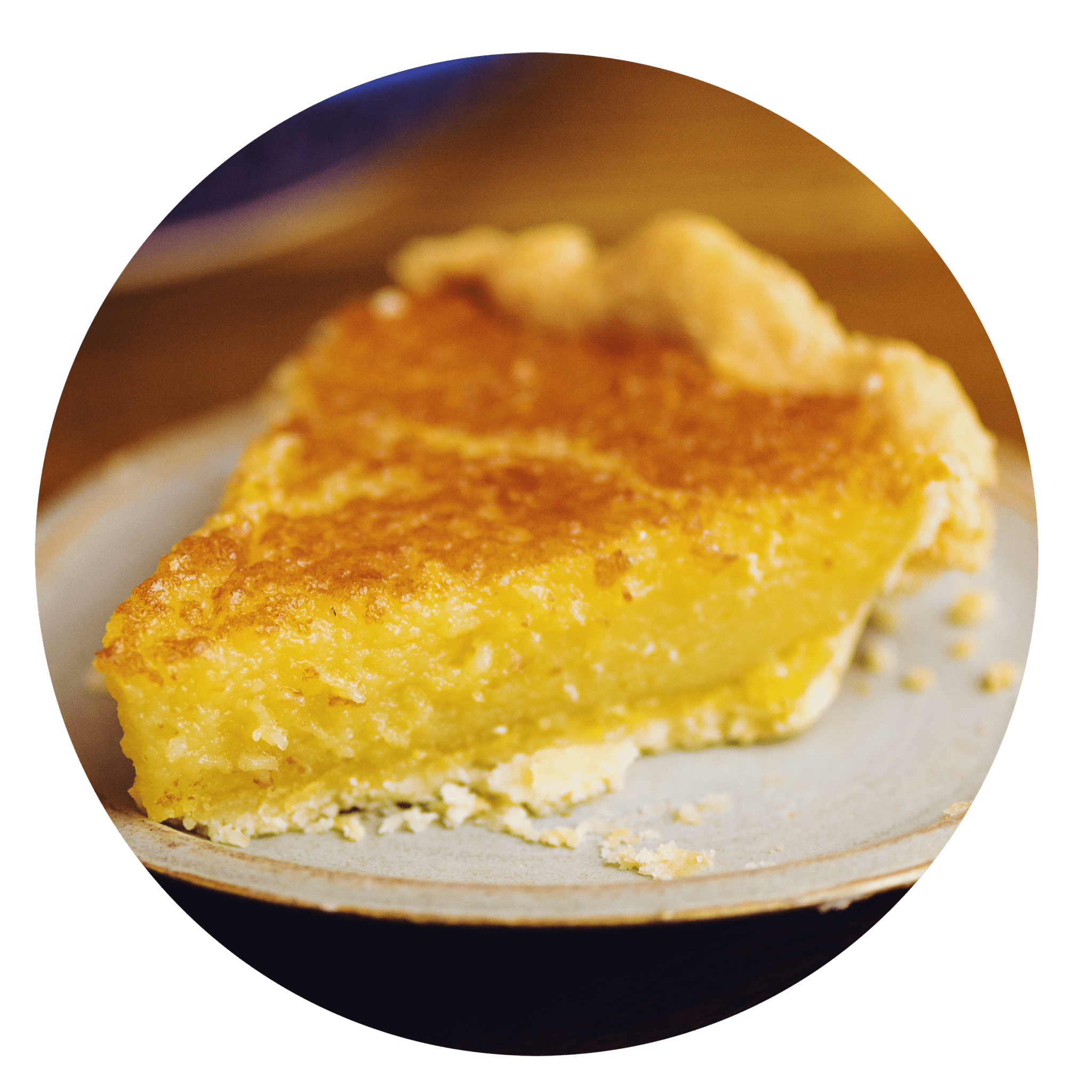 Lemon chess pie slice with creamy buttermilk custard and fresh lemon from Petee's NYC bakery